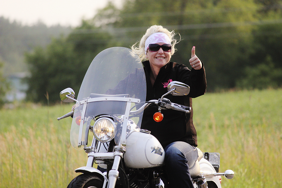 Malinda Johnson riding through Grand Rounds Scenic Byway in Minnesota